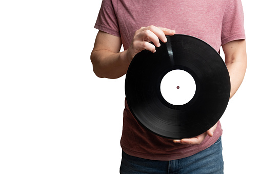 Man hold a vinyl record with blank label