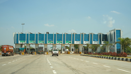 Gujarat, India - March 22 2023: Toll plaza on Ahmedabad Mumbai highway.