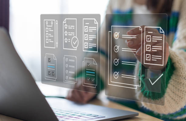 istock Human use laptop checking mark on checklist, survey, form, check mark, yes, questionnaire, filling digital, list, assessment, exam, vote, answer, to do list, evaluation, business and education concept 1805567733