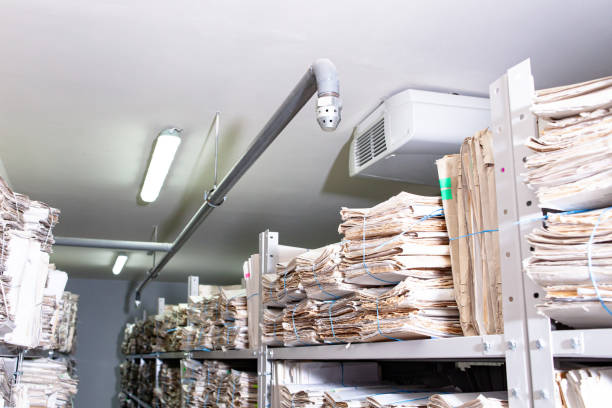 istock shelves with paper documents. fire extinguishing system in the room with documents 1805582087