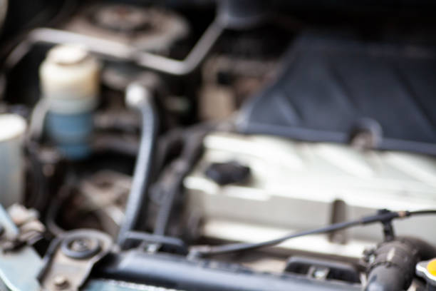 istock Get a glimpse under the hood of your car with this snapshot featuring engine components, hoses, and wires, an insider's view into the heart of automotive machinery 1805582101