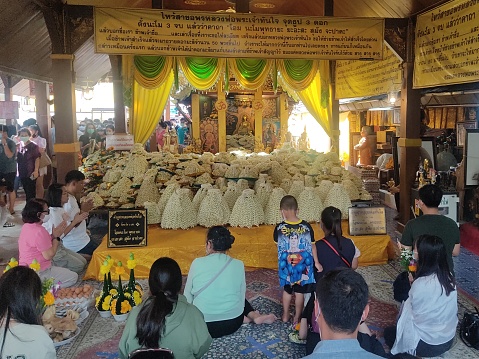 Ho Chi Minh City, Vietnam - May 10th, 2017: Buddhist revered ceremony in temple beautiful architecture, many statues sanctuary express cultural beauty of religious spirituality in Ho Chi Minh, Vietnam