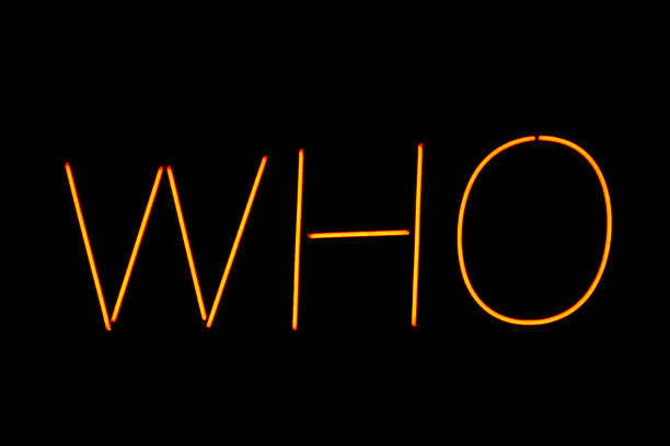 a who neon writing isolated on black background