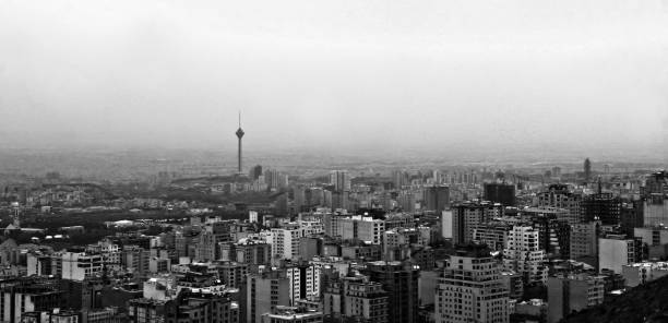 istock a city skyline and mountain is shown in black and white 1805609404