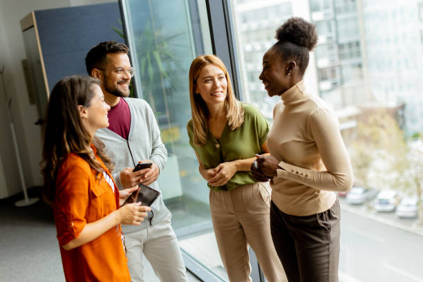 istock Young multiethnic startup team working in the modern office 1805658330