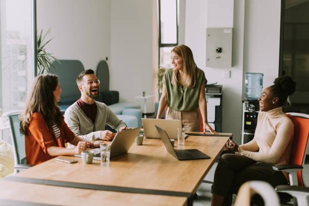 istock Young multiethnic startup team working in the modern office 1805658375