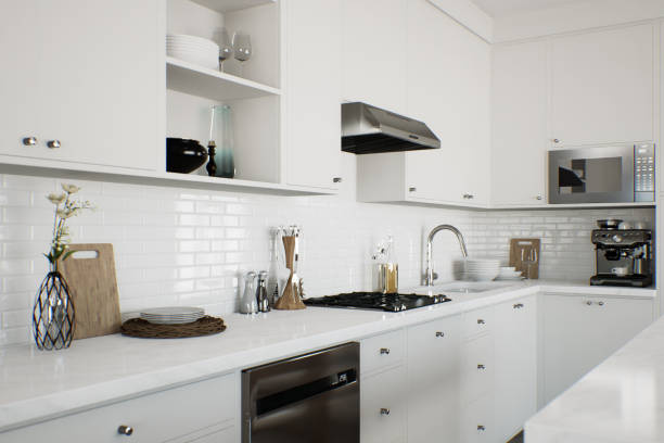 istock White kitchen with kitchen appliances and utensils. Stylish kitchen in traditional style. 3D rendering 1805661136