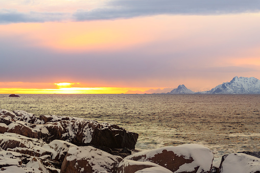 Panaorama view over the Lofoten islands in Northern Norway during a cold winter sunset