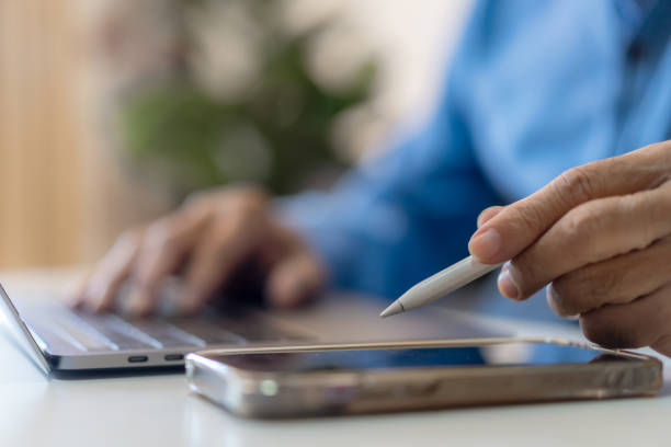 istock Man working online with laptop computer on desktop screen for advertising, mockup, technology, advertising, search information, blogger, creative design, learning, webinar, shopping, study, watching 1805665256
