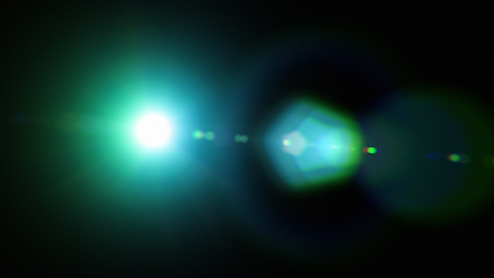 Green futuristic lens flare overlay on black background design element