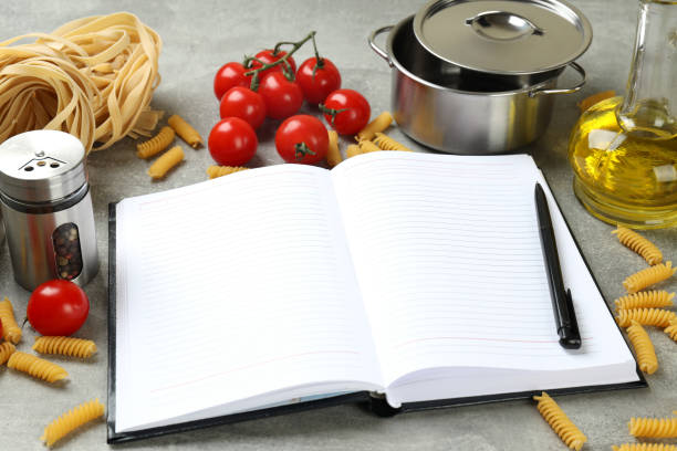 istock Concept of recipe on gray textured table, space for text 1805684359