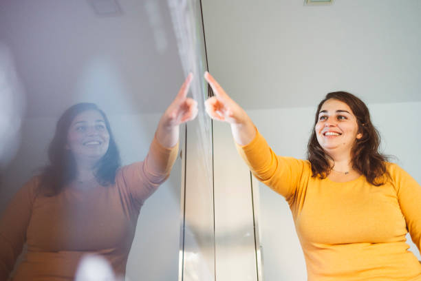 istock a woman used smart devices in her home 1805684400