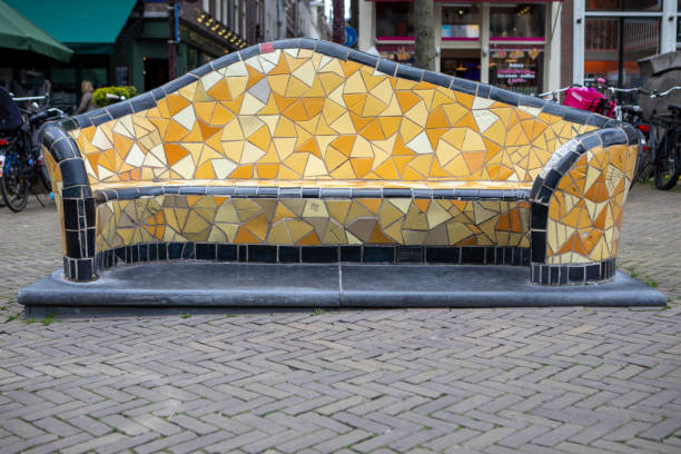 Yellow mosaic sofa at the Nieuwmarkt