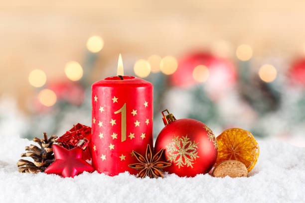 istock First 1st Sunday in advent with burning candle Christmas time decoration with copyspace copy space 1805698643