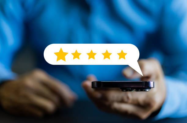 istock Human use phone showing give feedback icon satisfaction survey, five star, customer, satisfaction, review, feedback, top service excellent, Quality assurance 5 star, positive, customer service 1805710595