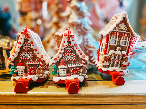 Close up color image depicting gingerbread houses on display and for sale in the store at Christmas.