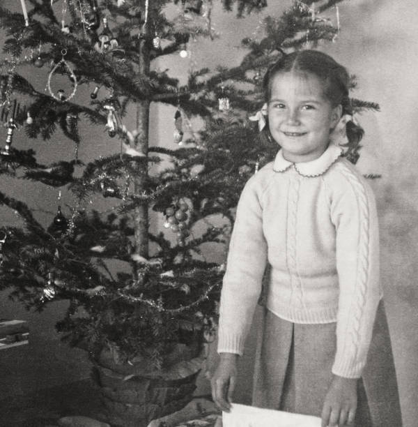 istock Little Girl under Christmas Tree. 1805717326