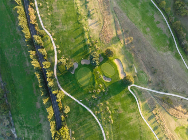 istock Aerial view of a golf course at sunset 1805749269
