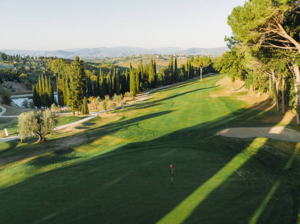 istock Aerial view of a golf course at sunset 1805749302