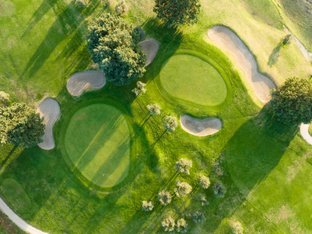 istock Aerial view of a golf course at sunset 1805749802
