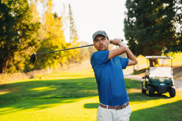 istock A golfer just after shooting the ball 1805750439