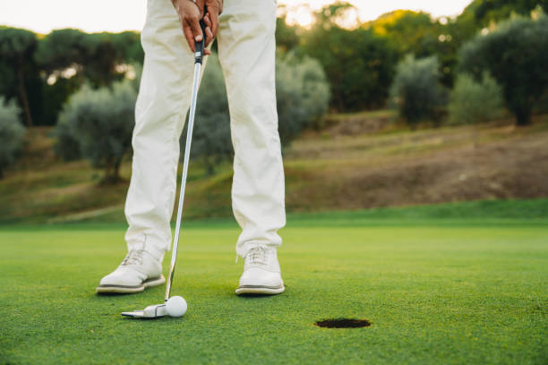 Closing putt on the green