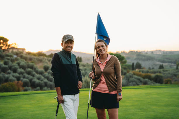 istock Portrait of two golfers looking at camera 1805751550