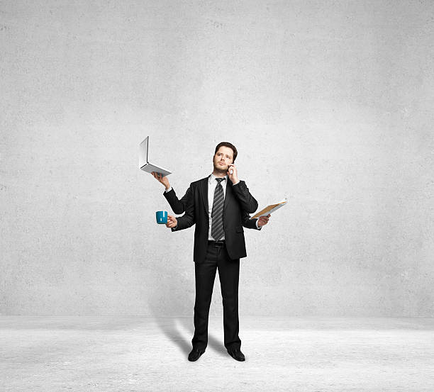 istock businessman with four arms 180577238