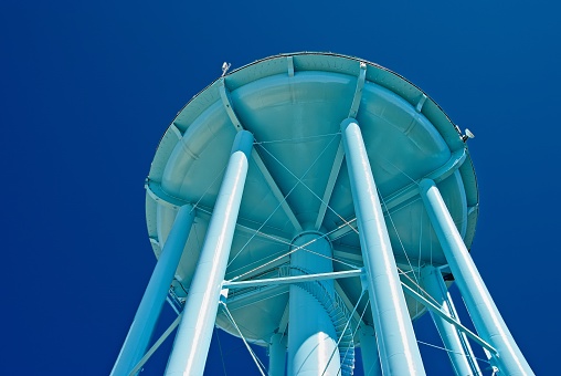Blue Water Tower on a Sunny Day with a Deep Blue Sky
