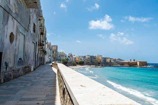 Promenade and beach in the old town of Marsala, Trapani, Sicily, Italy