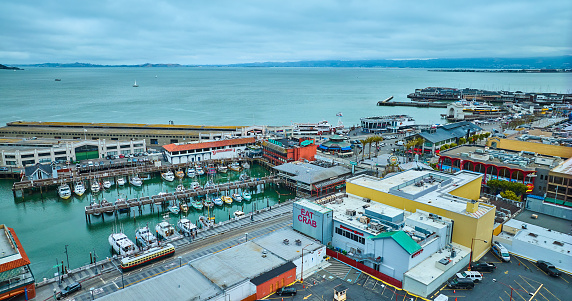 Image of Pier 45 aerial with Eat Crab sign on building next to San Francisco Bay, CA