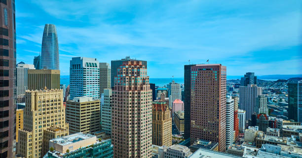 istock San Francisco downtown skyscrapers with Salesforce Tower aerial cloudy blue sky day, CA 1805816480