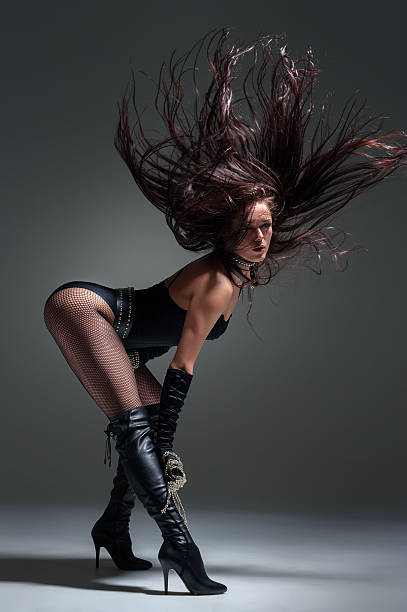 Woman dancing in studio stock photo