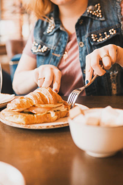 istock Croissant with egg on a plate, Breakfast in the cafe 1805846848