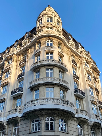 Facade of an apartment building in a city with classical style and tiles