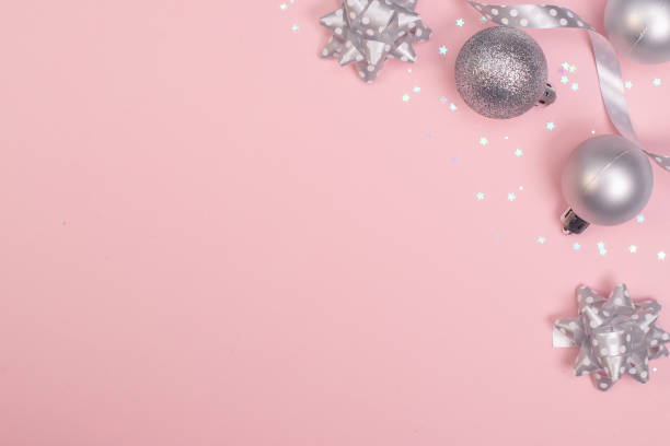 istock Christmas composition flatlay christmas silver tree toys at the pink background. 1805858134