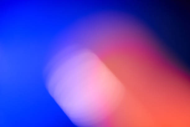 istock Abstract defocused lens red light leak on blue background 1805860519