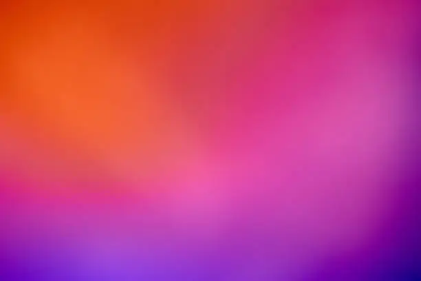 Photo of Abstract defocused lens red light leak on blue background