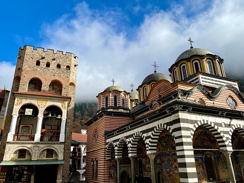 Bulgaria - Rila Monastery ( Rilski Manastir).  The Monastery of Saint John of Rila, also known as Rila Monastery is the largest and most famous Eastern Orthodox monastery in Bulgaria. It is situated in the southwestern Rila Mountains, 117 km south of the capital Sofia in the deep valley of the Rilska River. It is a site UNESCO