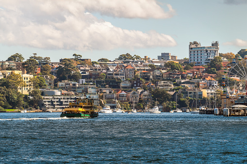 North Sydney skyline viewed from ferry departing from Circular Quay on a day