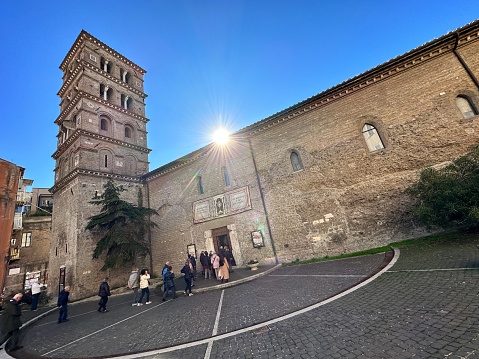 The photo was taken at Albano Laziale on a beautiful mid-autumn day. It shows the ancient St Peter’s Church with its elegant bell tower, in Romanesque style, going back to the IV and XII century respectively.