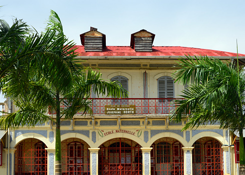 Cayenne, French Guiana: Joséphine Horth Nursery School (Ecole maternelle Joséphine Horth) - built in 1916 in the style of traditional Creole houses -  it took the name Horth in 1925 in homage to a teacher who fought for the education of local children - Thiès Avenue, facing Palmistes Square.