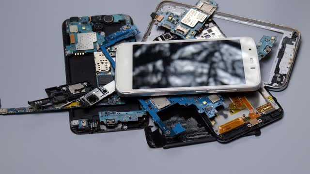 Obsolete old recycle  mobile phone and broken smartphones ,  mobile phone recycling. Recycle e-waste , mainboard old