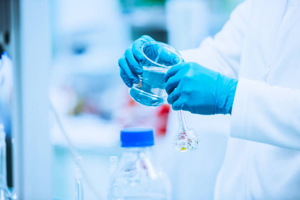 istock Pharmacist making a medicines in the laboratory, pharmacy production concept 1805918079