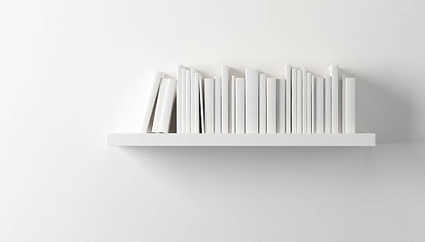 shelf with white books stock photo