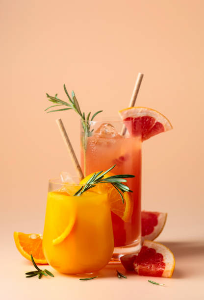 istock Orange and grapefruit juice with rosemary and ice. 1805935560