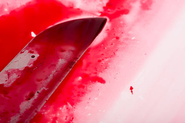istock Halloween concept : Bloody knife with blood splatter 180594348