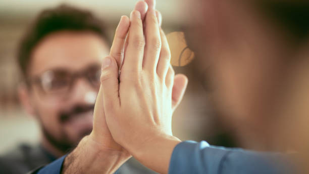 istock Business team people give high five in the office 1805951459