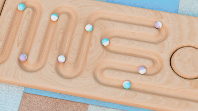 A beautiful Video Loop of a marble wood maze with balls.
