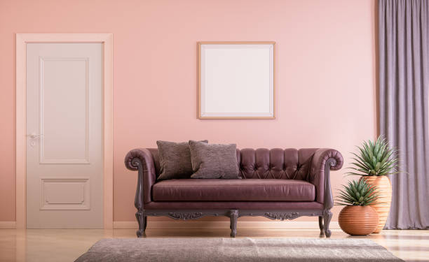 istock Poster frame mockup interior scene. A single square poster frame on the wall. wide shot interior room with furniture and single exterior door. 3d rendering. 1805969758